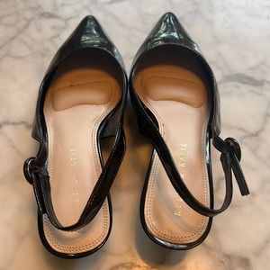 Black faux patent leather kitten heel pumps worn once. In box